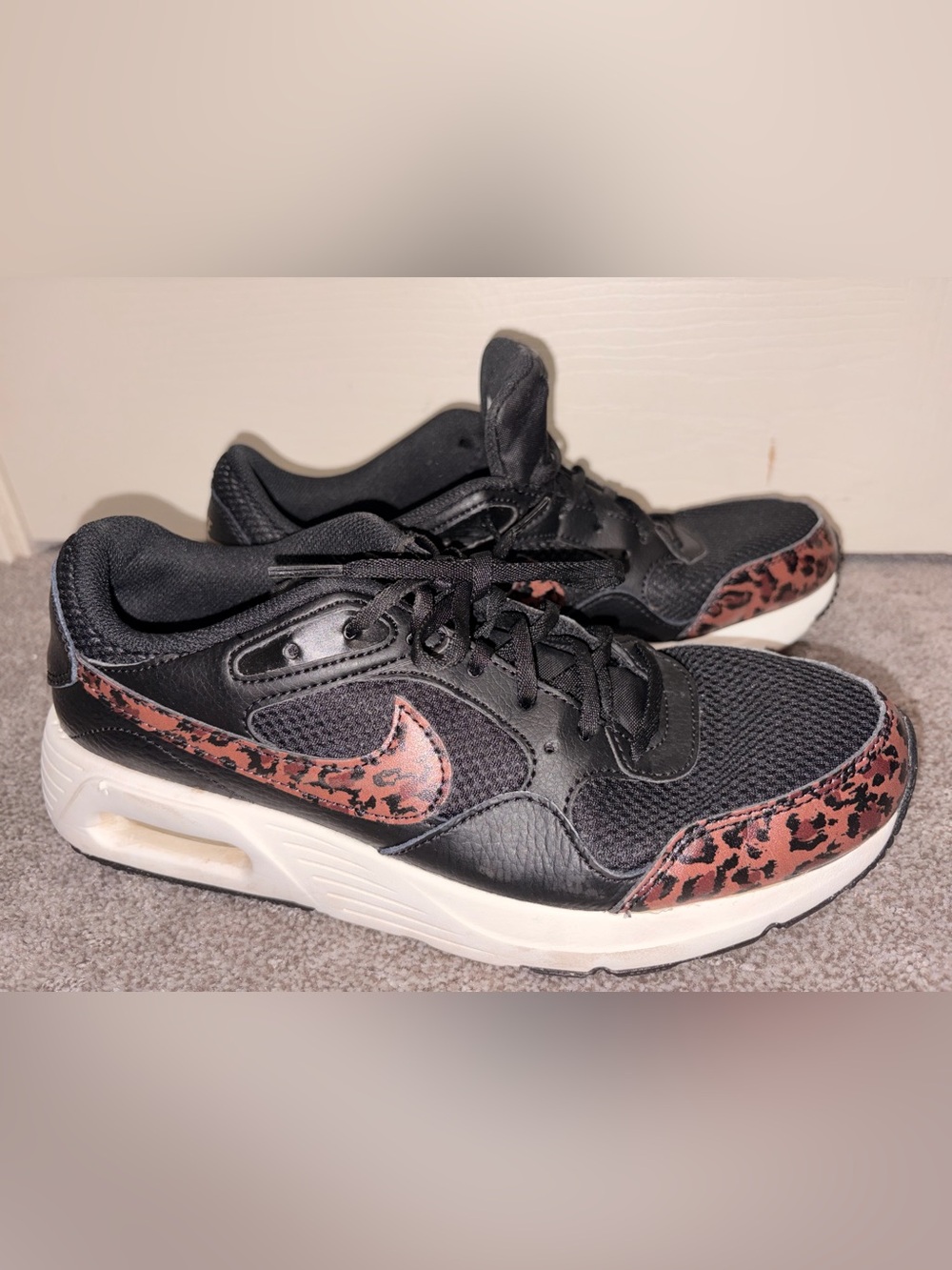 Nike Women's Black Athletic Sneakers with Pink Leopard Swoosh